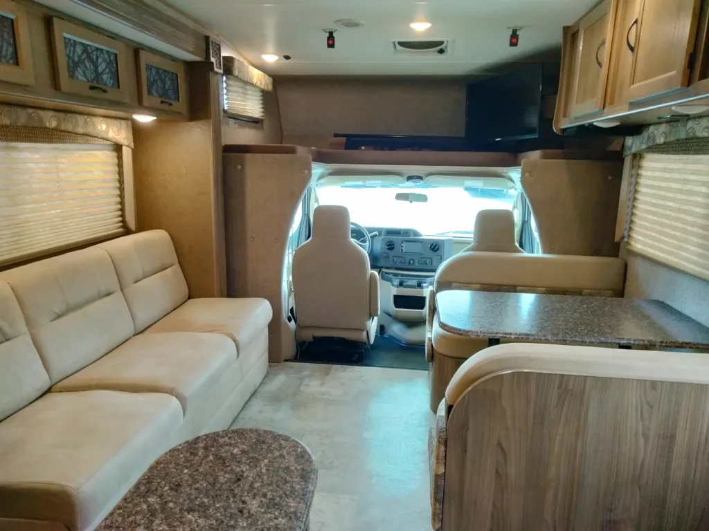 The view from the bedroom to the cab of the 2018 Coachmen Freelander 31 BH.