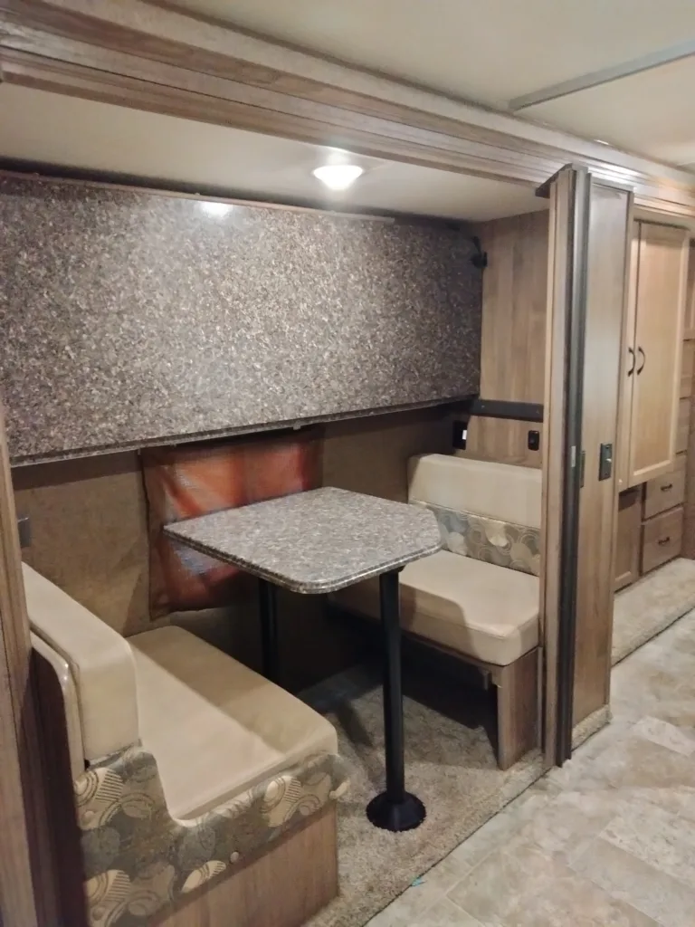 The dinette of the 2018 Coachmen Freelander 31 BH.